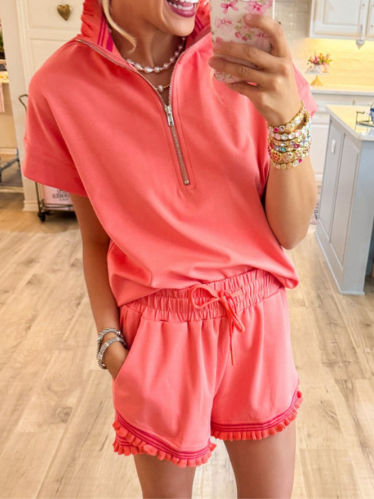 Coral ruffle trim top