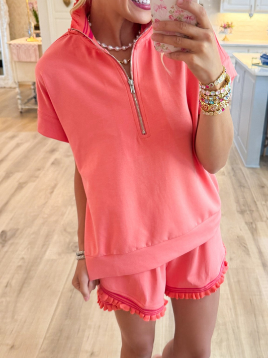 Coral ruffle trim top